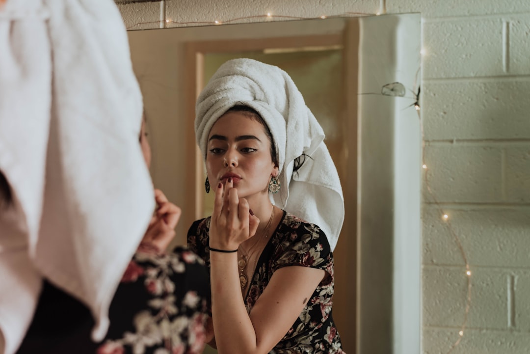 A serene morning scene with a minimalistic beauty setup, including skincare products and a mirror, conveying simplicity and efficiency.